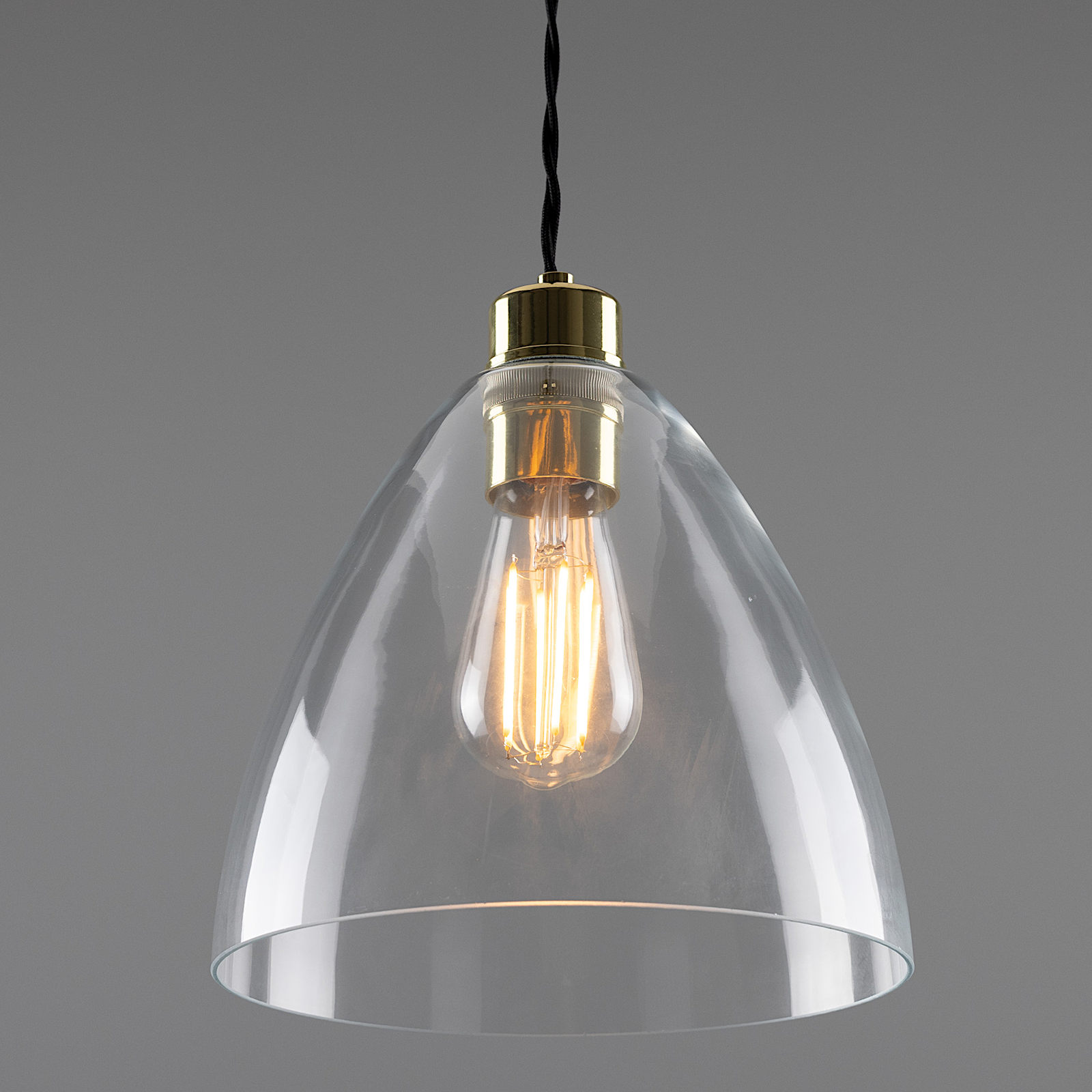 Kleine Pendelleuchte mit klarem Glasschirm