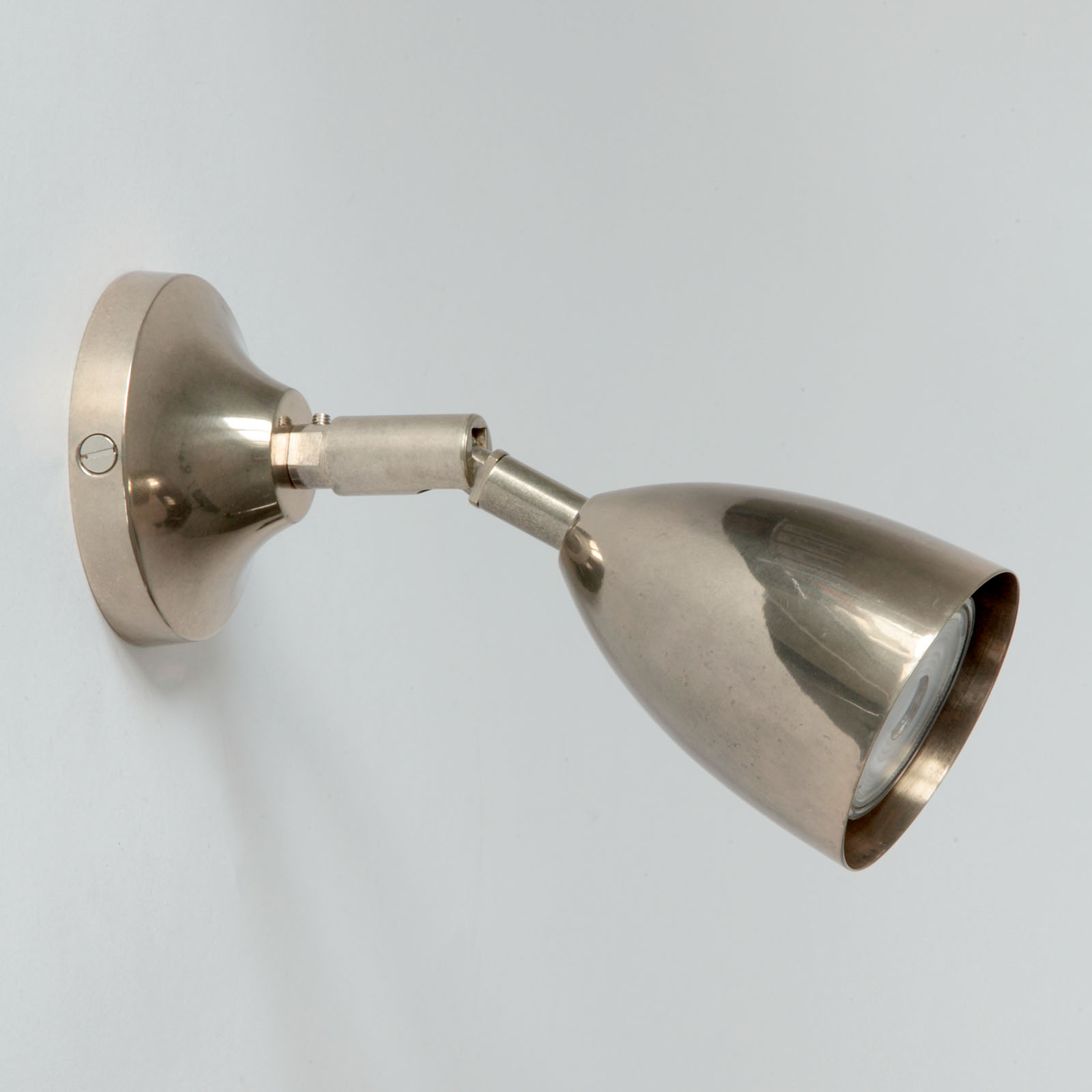 Small spot wall light made of brass, e.g. for the bedside: Alt-silbern patiniert