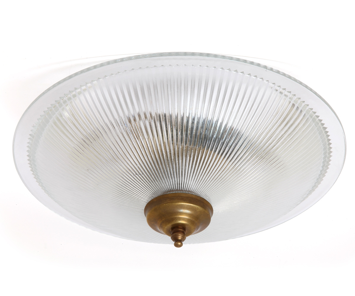 Flat ceiling light made of holophane glass