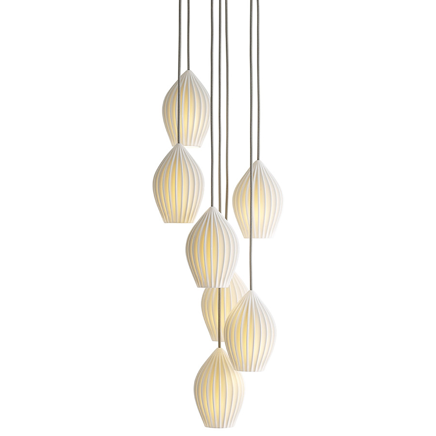 Group of seven porcelain suspended luminaires FIN 7