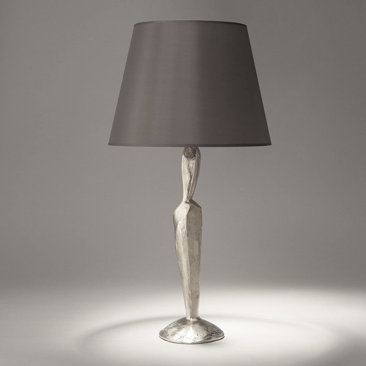 Sculptural bronze cast table light JUDE with fabric shade