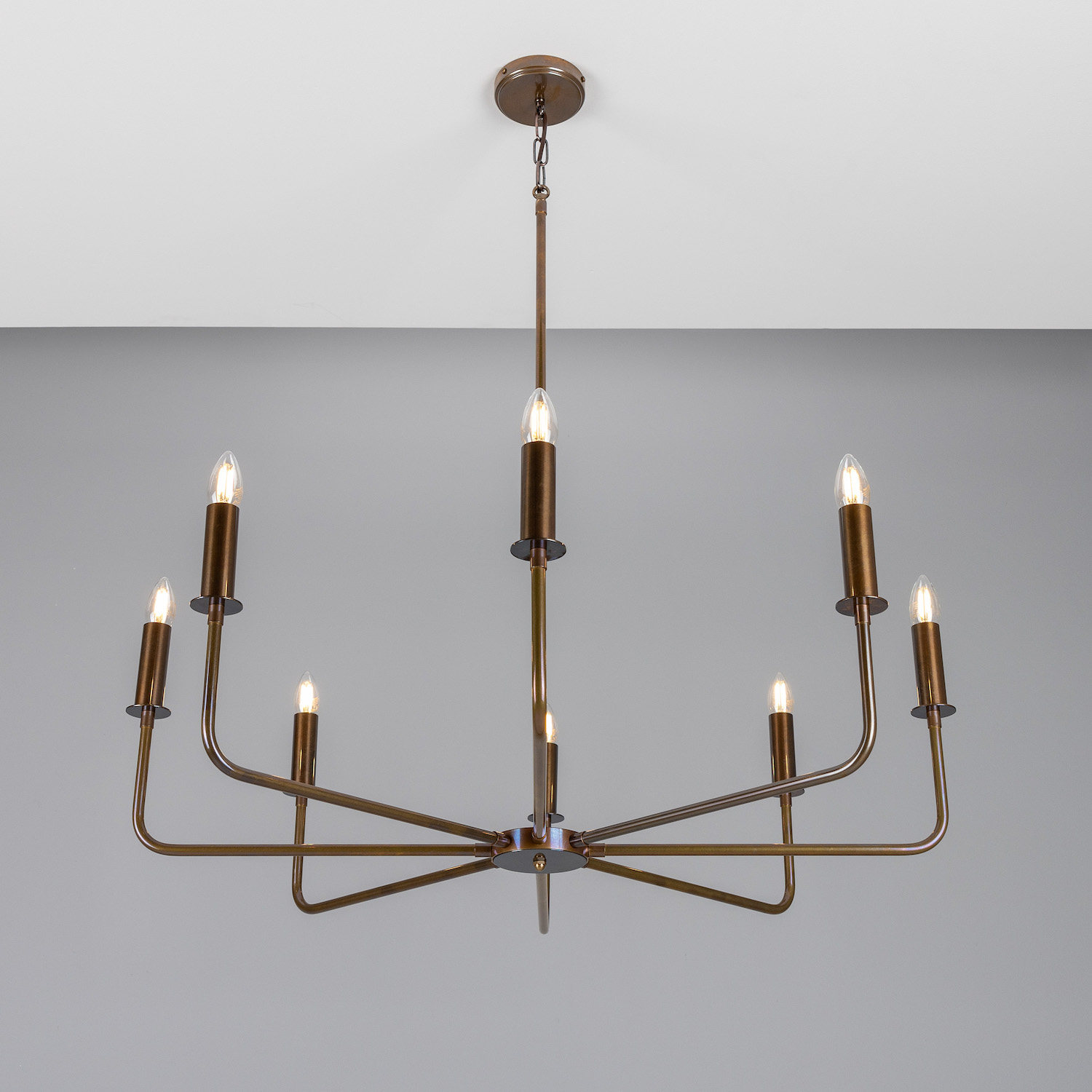 Modern Chandelier with Eight Brass Arms and Candle Bulbs